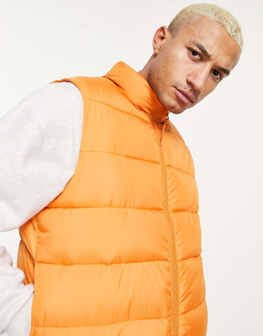 Orange puffy vest sale