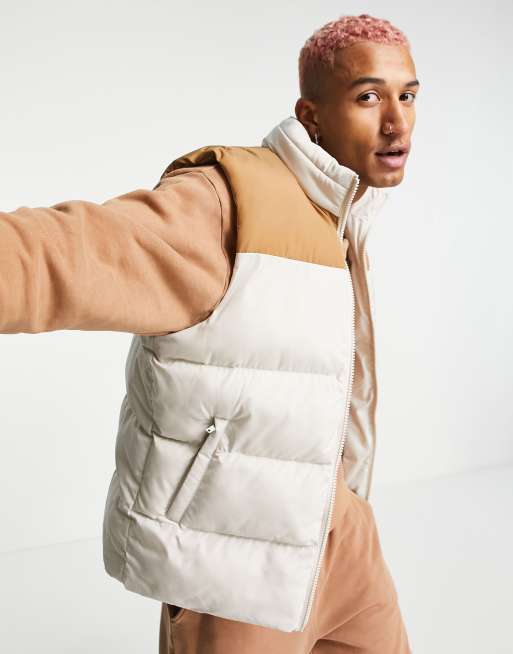 ASOS DESIGN puffer vest with contrast panel and packable hood in ecru