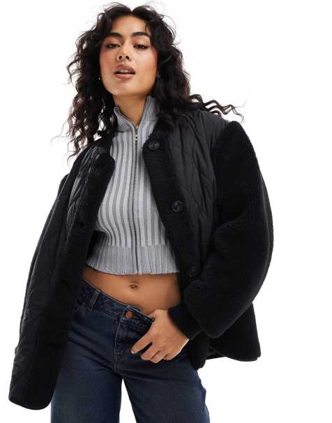 ASOS DESIGN – Pufferjacke in Schwarz mit gespleißtem Teddyfell-Design - view 1