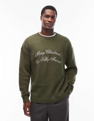 ASOS DESIGN - Pull décontracté en maille avec inscription Merry Christmas Ya Filthy Animal » - Vert