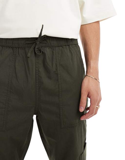 ASOS DESIGN pull on cargo sweatpants in khaki with elastic waist