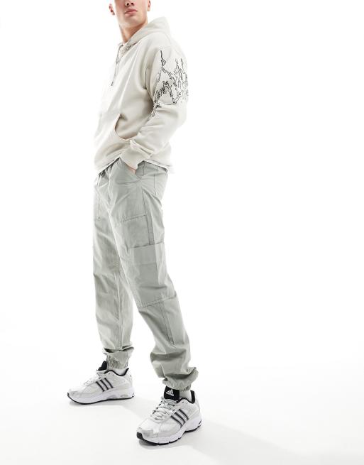 ASOS DESIGN pull on cargo trackies in washed sage green with elasticated waist, 4 of 5