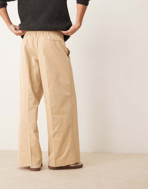 sachin and babi light blue dress ASOS DESIGN pull on elastic waist loose leg dress pants in camel