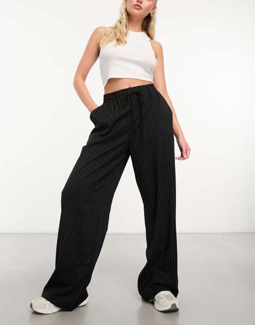 ASOS DESIGN pull on pants in black with white stripe | ASOS