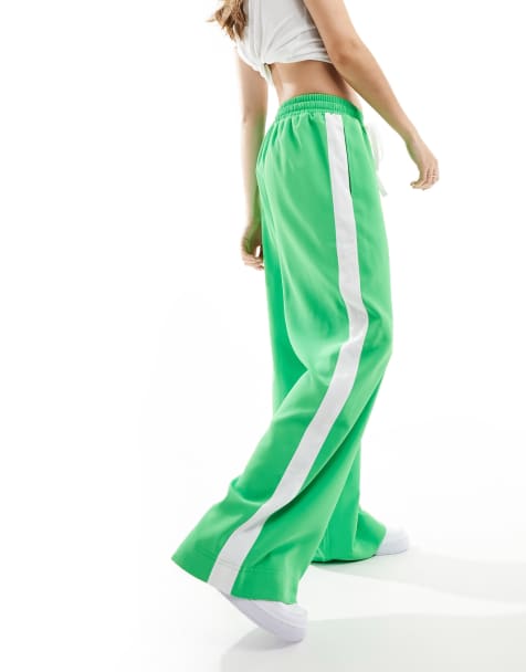 ASOS DESIGN pull on trousers with contrast panel in bright green