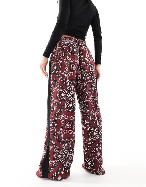 ASOS DESIGN pull on pants with contrast panel in dark cherry bandana print