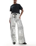 [ASOS DESIGN] ASOS DESIGN pull on pants with contrast panel in geo mono-Multi L Mono geo