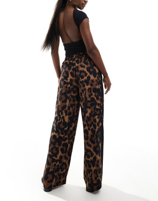 ASOS DESIGN pull on pants with contrast panel in leopard print