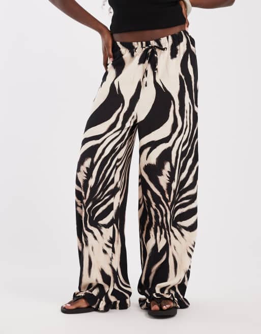 ASOS DESIGN pull on pants with frill hem in animal print, 2 of 5
