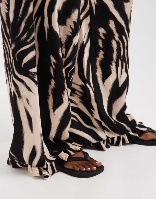 ASOS DESIGN pull on pants with frill hem in animal print, 4 of 5