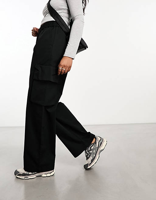 ASOS DESIGN pull on pants with pockets in black