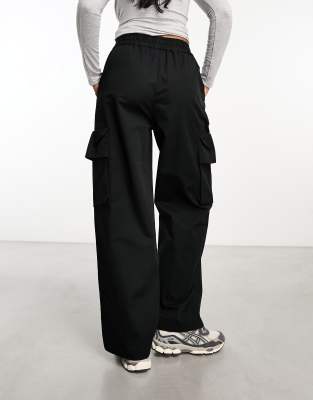 ASOS DESIGN pull on pants with pockets in black