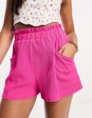 Asos Design Pull On Short With Pockets In Pink