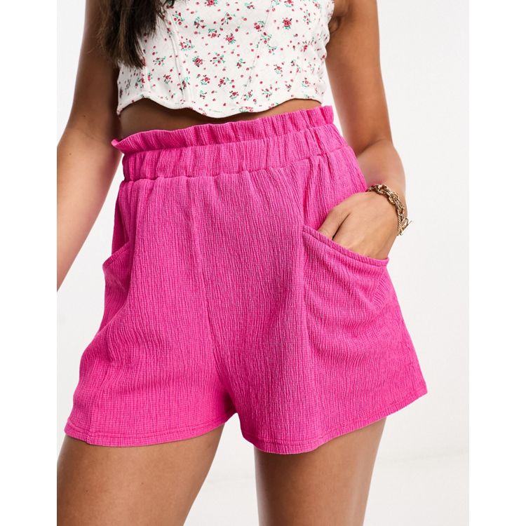 ASOS DESIGN pull on short with pockets in pink