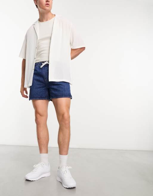 ASOS DESIGN pull on shorter length denim shorts in mid wash blue