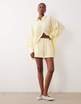 Asos Design Pull On Shorts In Yellow