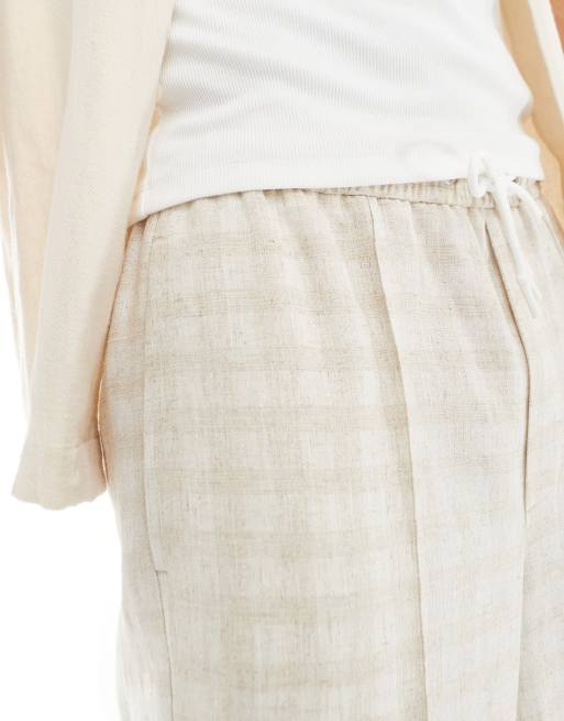 ASOS DESIGN pull on smart oversized tapered linen blend pants in neutral check, 2 of 5