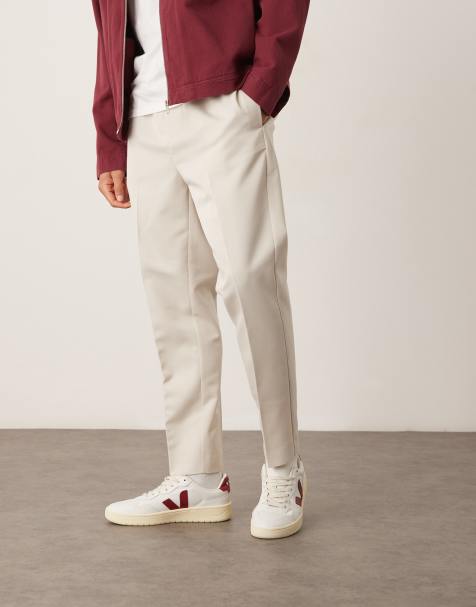 ASOS DESIGN pull on smart tapered fit trousers in stone - view 1