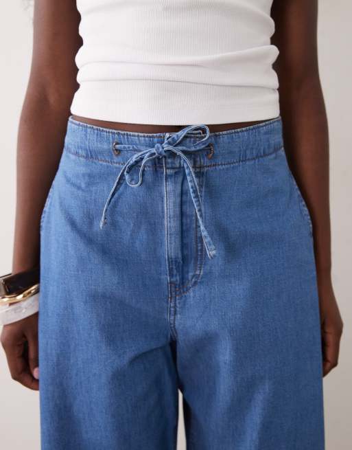 ASOS DESIGN pull on soft denim horsehoe trouser in midwash blue, 3 of 5