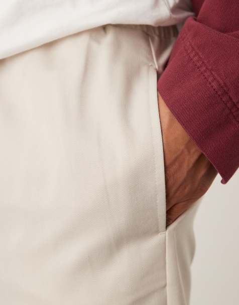 ASOS DESIGN pull-on tapered fit dress pants in stone - view 1
