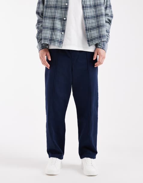 ASOS DESIGN pull on tapered pintuck trousers in navy - view 1