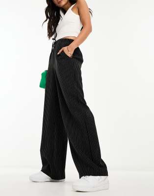 ASOS DESIGN pull on pants with pockets in black