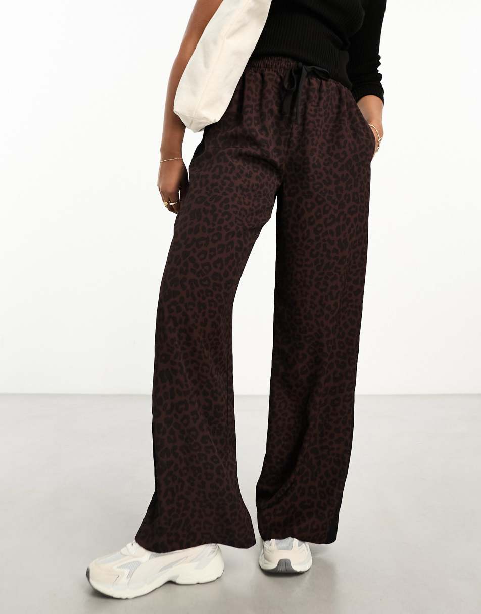 ASOS DESIGN pull on trouser with contrast panel in animal print