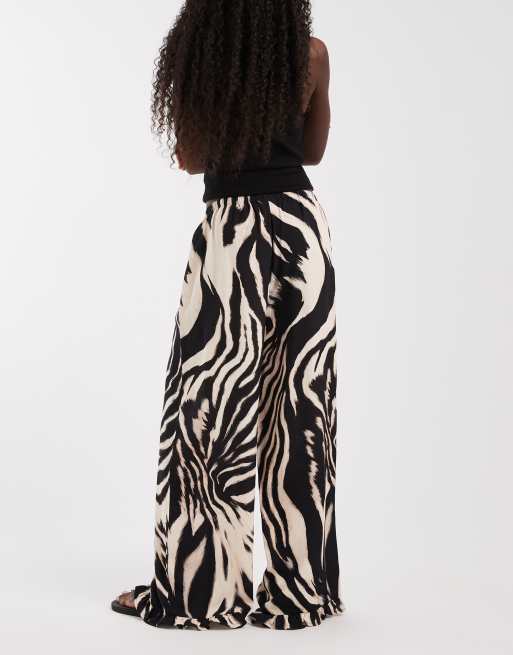 ASOS DESIGN pull on trouser with frill hem in animal print, 5 of 5