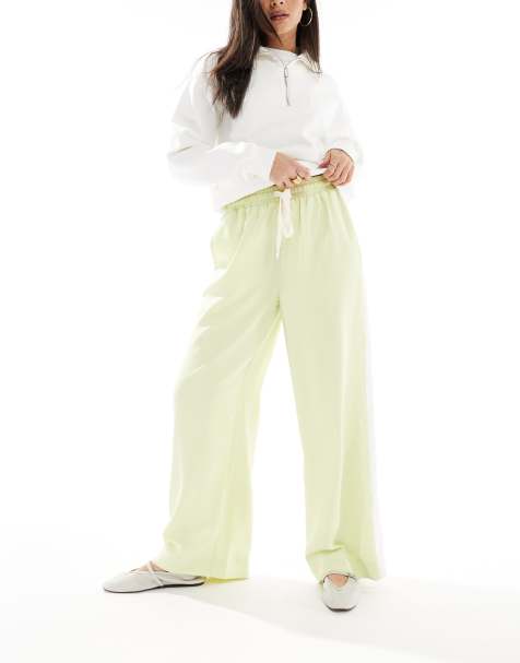 ASOS DESIGN pull on trousers with contrast panel in lime - view 1