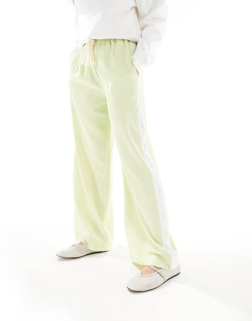 ASOS DESIGN pull on trousers with contrast panel in lime, 2 of 5