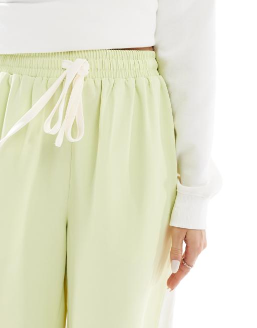 ASOS DESIGN pull on trousers with contrast panel in lime, 5 of 5