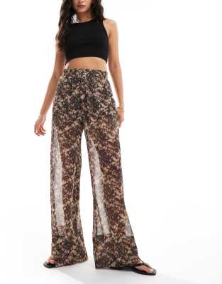 ASOS DESIGN pull on trousers with sheer overlay in abstract print-Multi