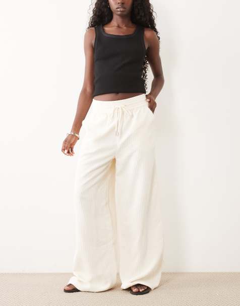 ASOS DESIGN pull on waist wide leg cord pants in eggnog - view 1