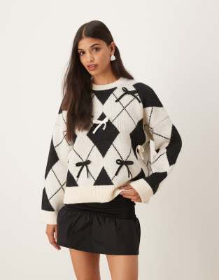 ASOS DESIGN - Pullover in Schwarz mit Rautenmuster und platzierten Schleifen
