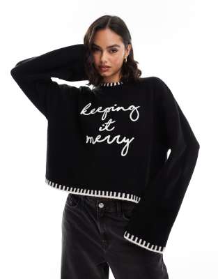 ASOS DESIGN - Pullover in Schwarz und Weiß mit Saumstich, Weihnachts-Slogan und Rundhalsausschnitt-Bunt