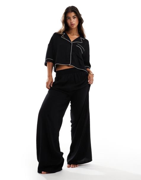 ASOS DESIGN – Pyjama-Hose in Schwarz mit weitem Bein und farblich abgesetzter Einfassung - view 1