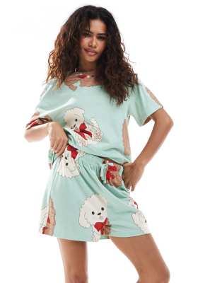 ASOS DESIGN - Pyjama in Grün mit Hund- und Schleifen-Prints, aus Oversize-T-Shirt und Shorts