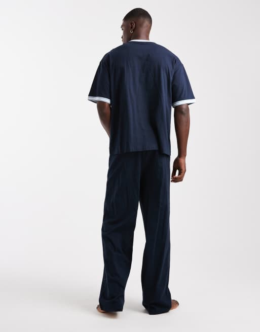 ASOS DESIGN – Pyjama in Marineblau mit kontrastierender Einfassung und weitem Bein, 4 von 4
