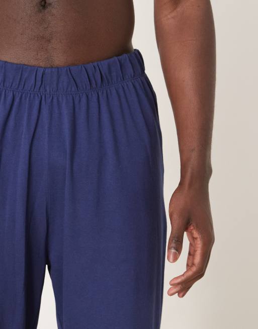 ASOS DESIGN – Pyjama in Marineblau und Weiß mit Waffelstruktur und Oberteil mit Henley-Ausschnitt, 2 von 4