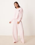 [ASOS DESIGN] ASOS DESIGN pyjama long sleeve lounge top and wide leg pants set with espresso embroidery motif in light pink-Multi L TBC
