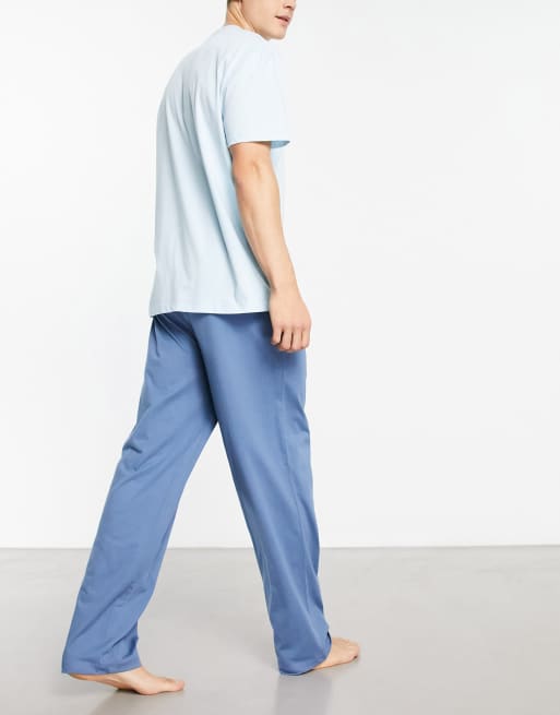 ASOS DESIGN – Pyjama mit T-Shirt und Hose in Blau und Orange mit Print, 4 von 4