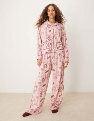 ASOS DESIGN - Pyjama-Set aus rosa Modal mit Rodeo-Muster, aus Hemd und Hose mit weitem Bein