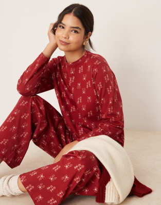 ASOS DESIGN - Pyjama-Set in Rot mit Schleifenmuster, aus Oberteil und Hose