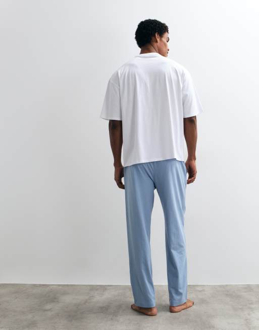 ASOS DESIGN pyjama set with apres ski graphic in white, 4 of 4
