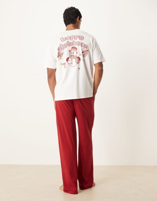 ASOS DESIGN pyjama set with Christmas characters graphic in red