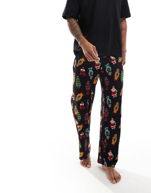 ASOS DESIGN pyjama set with christmas decorations in black