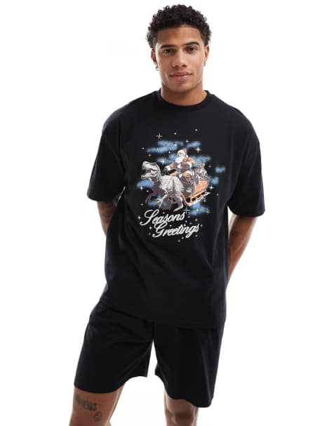 ASOS DESIGN pyjama set with Christmas dinosaur sleigh print in black - view 1