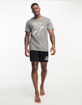 ASOS DESIGN pyjama set with Jurassic Park print t-shirt and shorts in black and grey