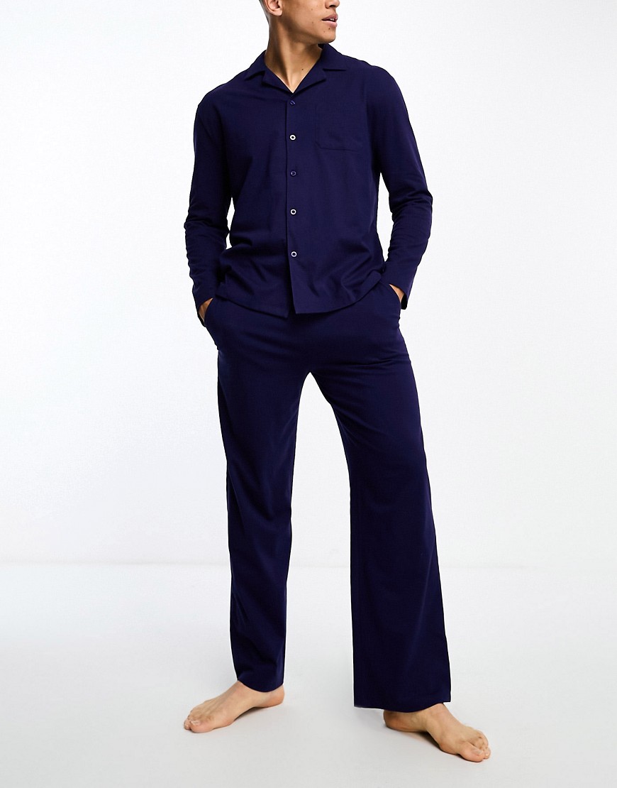 ASOS DESIGN pyjama set with long sleeve shirt and trousers in navy jersey