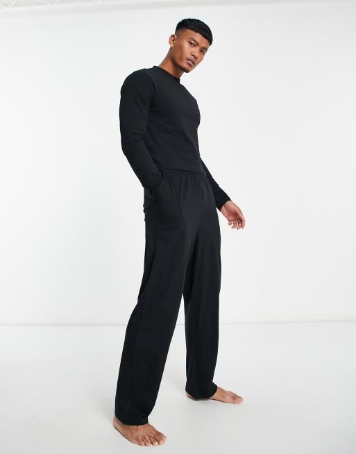 ASOS DESIGN pajama set with t-shirt and pants in black with fleece